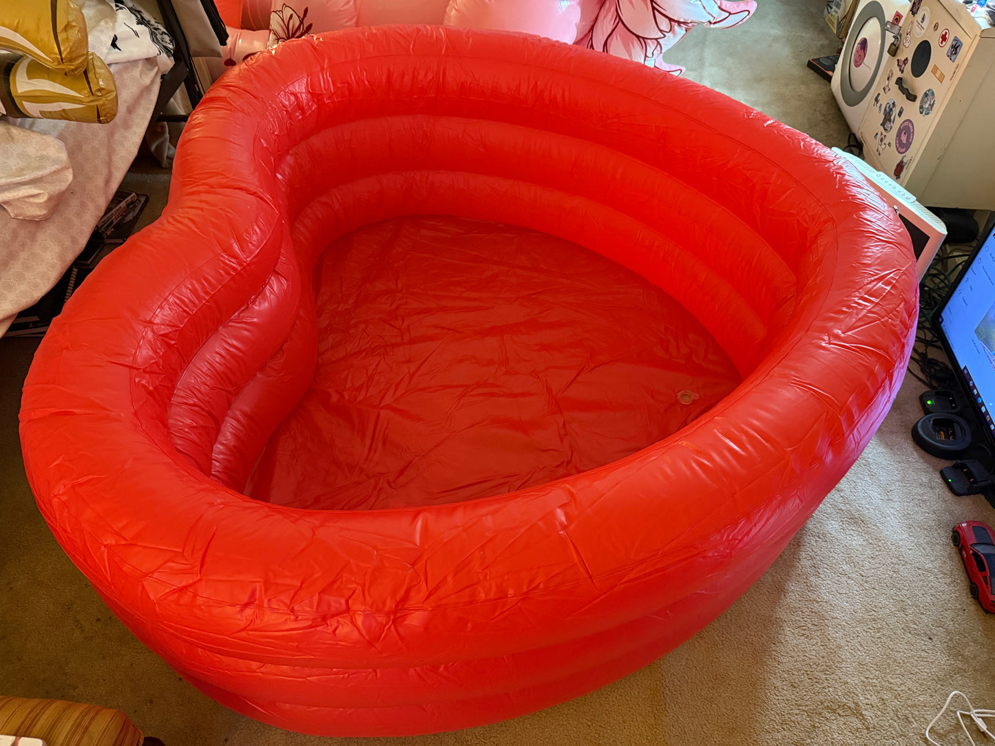 Inflatable heart pool